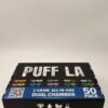 Closed black Puff LA dual chamber 50-pack master box containing 2G liquid diamond and live resin vapes.