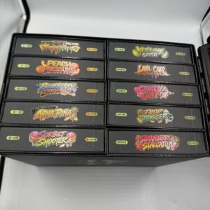 Opened Hollowtips 2g Disposable master display box showing Mango Mac 10, Key Lime Glock, and Lava Cake Launcher strains