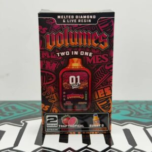 Front view of the Volumes 2G Two in One retail box showing the Trap Tropical and Sunny D dual flavors.