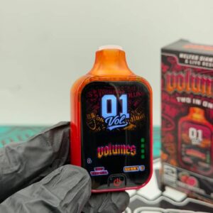 The front of the Volumes 2G vape device displaying a digital screen with active flavor indicators.