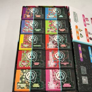 Open display box revealing ten Arcadia Fusion X-Ray Edition dual flavor disposable devices.