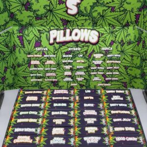 Open wholesale master case displaying Pillows Arcade Edition 14G units and strain menu