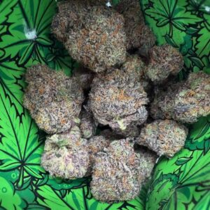 Close-up view of premium cannabis flower nugs inside the Pillows Arcade Edition packaging