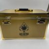 A heavy-duty metallic gold wholesale briefcase with dual combination locks for the Ace Ultra Premium 4g Disposable Master Box.