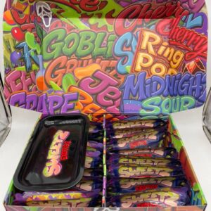 An open Sweetz Exotics Box display case filled with 3.5g mylar bags and a black branded rolling tray.