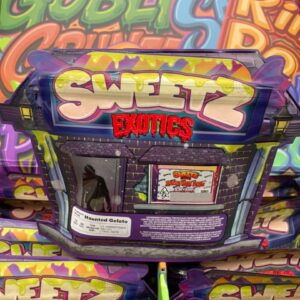 A haunted-house-shaped 3.5g mylar bag of Haunted Gelato flower from the Sweetz Exotics Box.